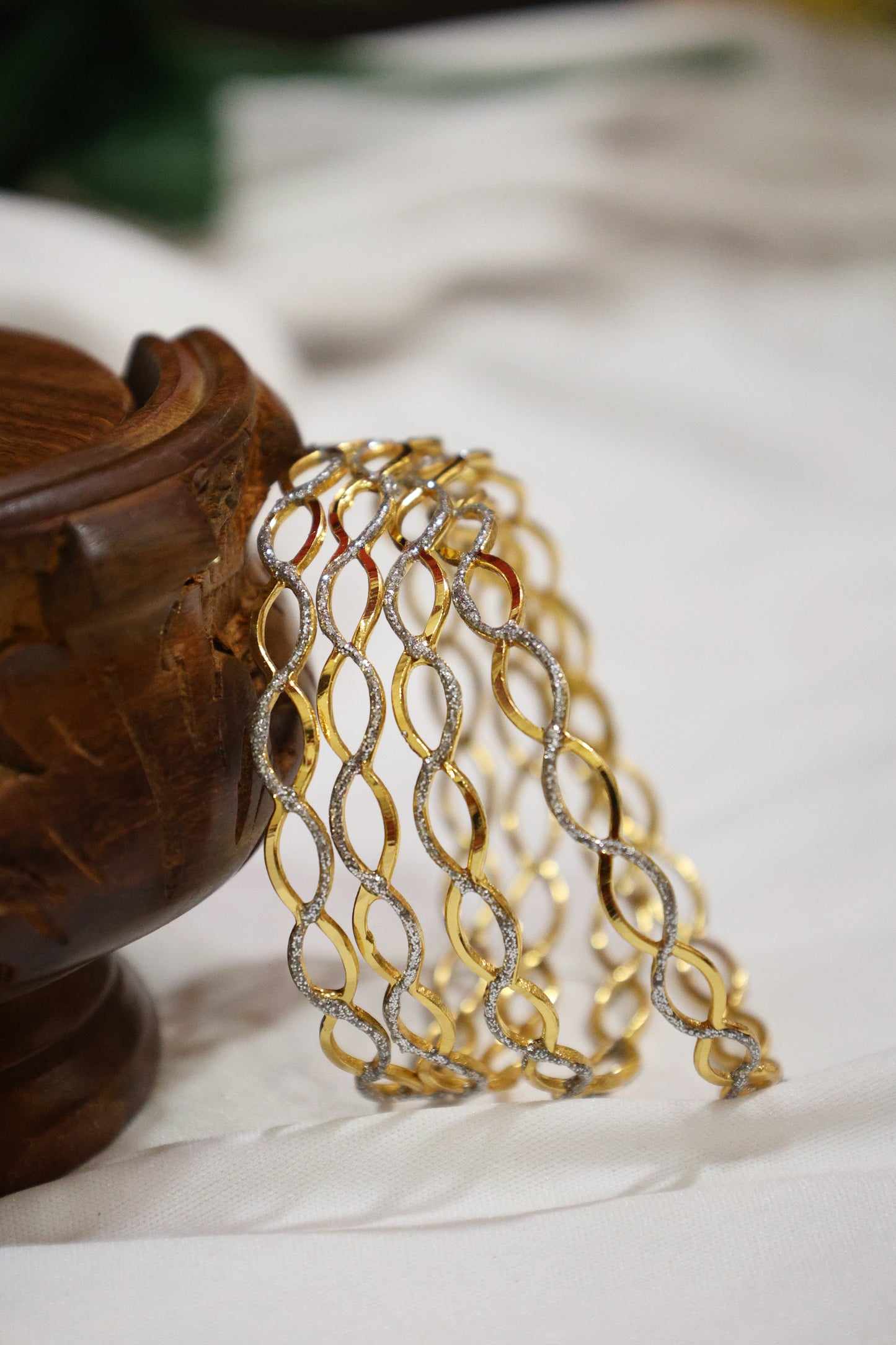 Dual-Tone Intertwined Bangles